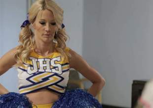 Super sexy blond-haired cheerleader Jessica Drake in sexy uniform gets her huge boobs fucked and her wet pussy eaten out by one fortunate dude. Scott Allen loves her big knockers! Breasty blonde makes his sex dreams come true!