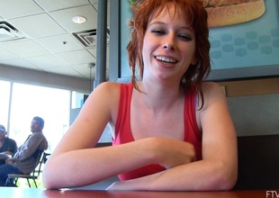Erotic outdoor solo model discharge with a radiant redhead